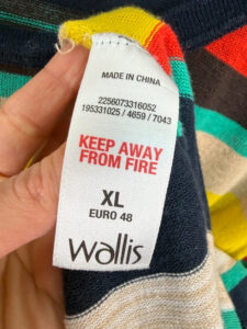 Wallis care label: wash at 30°, iron low, dry flat