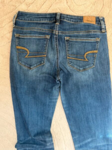 American Eagle Stretch Low Rise 8" Bootcut Flare Jeans — photo 7 of 10