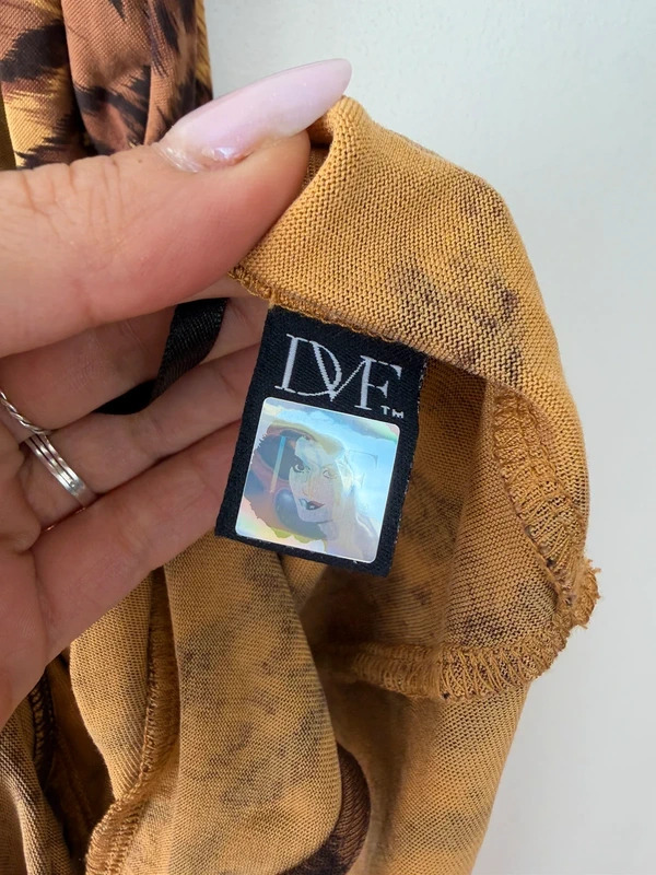 DVF label with a holographic panel