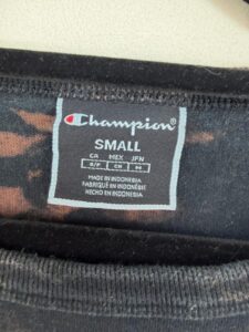 Label on a Champion piece, UK 8, Y2K
