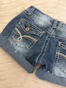 Angels Ultra Low Rise 6.5” Denim Cuffed Shorts — photo 8 of 13