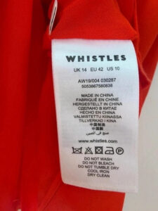 Whistles care label: dry clean only, do not wash, do not tumble dry, do not bleach, iron low