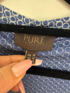 Label on a Pure Collection piece, UK 16