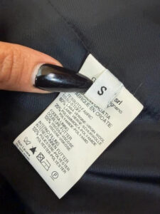 Marithé+François Girbaud care label: do not wash, dry clean only, do not bleach, iron low, wash inside out