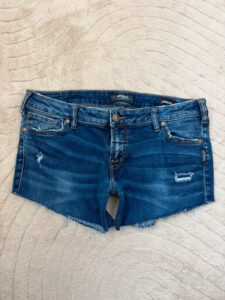 Silver Women's Low Rise 8” Distressed Micro Cutoff Jeans Shorts — photo 5 of 13