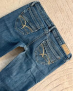 Garage Women's Y2K Ultra Low 6.5”Rise Flare Petite Jeans — photo 6 of 15