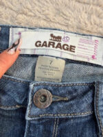Garage Women's Y2K Ultra Low 6.5”Rise Flare Petite Jeans — photo 7 of 15