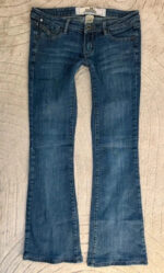 Garage Women's Y2K Ultra Low 6.5”Rise Flare Petite Jeans — photo 8 of 15