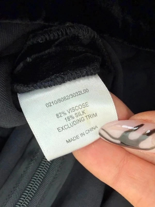 Hobbs label: 82% viscose, 18% silk, made in China