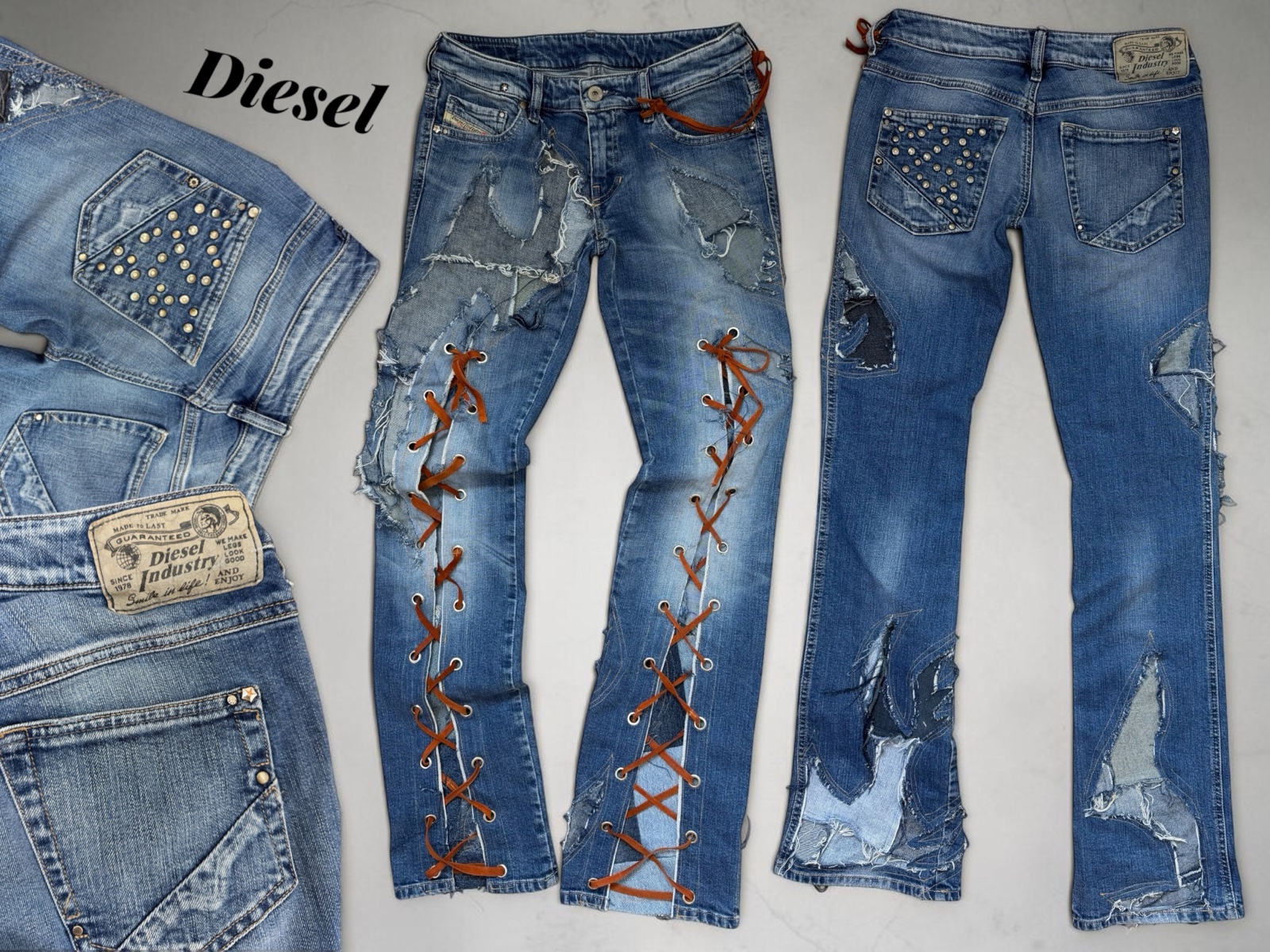 Custom Diesel low rise jeans laced up the leg with brown cord, studs and denim patches, laid flat